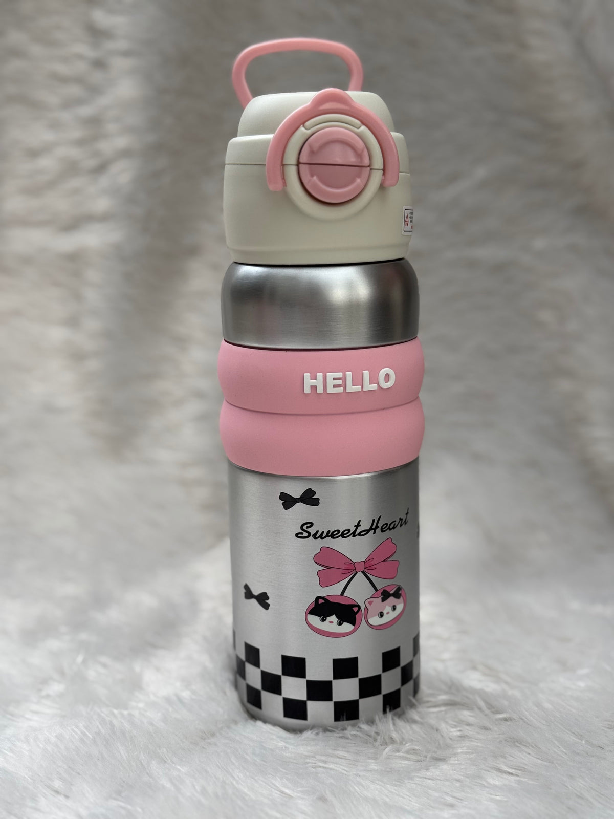 "Hello" series stainless steel vacuum-insulated water bottles 600 ml featuring cute cartoon character graphics and colorful silicone grip bands.