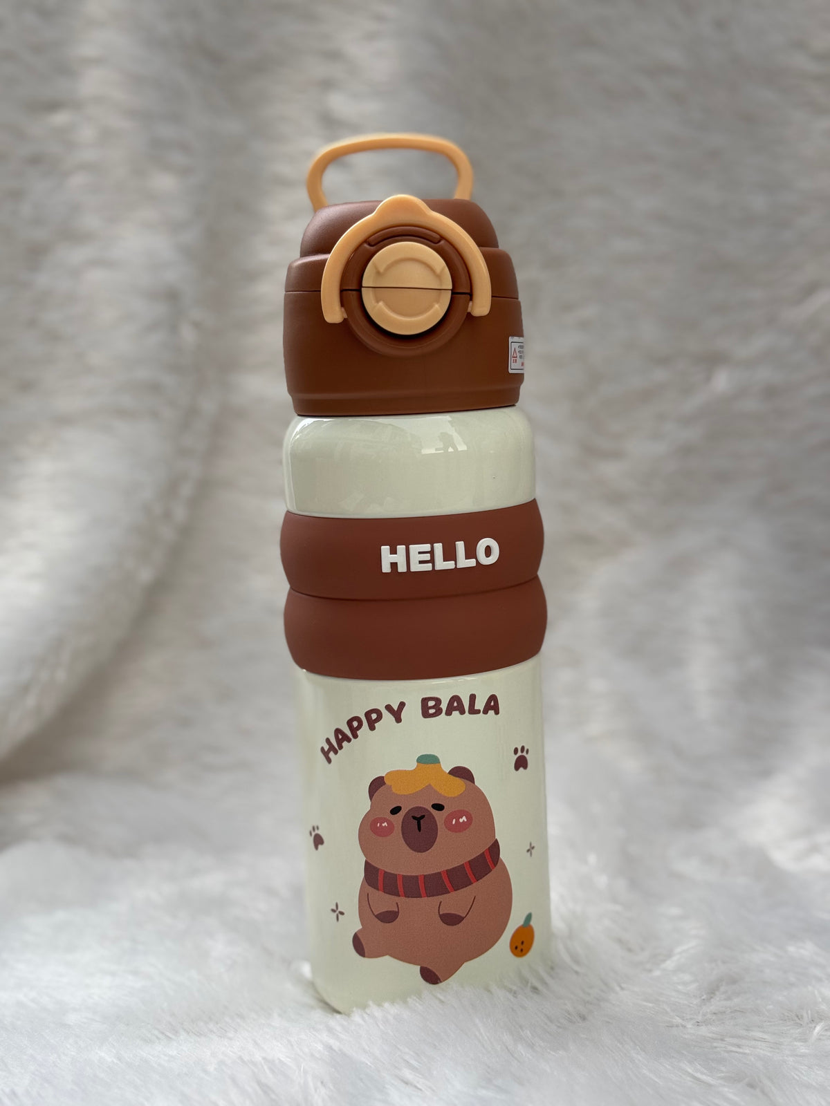 "Hello" series stainless steel vacuum-insulated water bottles 600 ml featuring cute cartoon character graphics and colorful silicone grip bands.